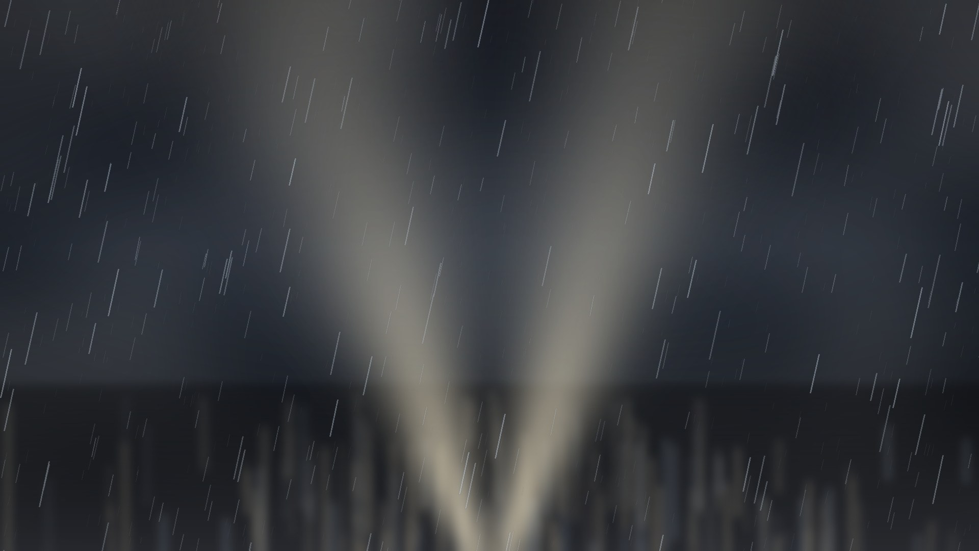 Headlight beams and rain over wet asphalt on a dark Central Valley road